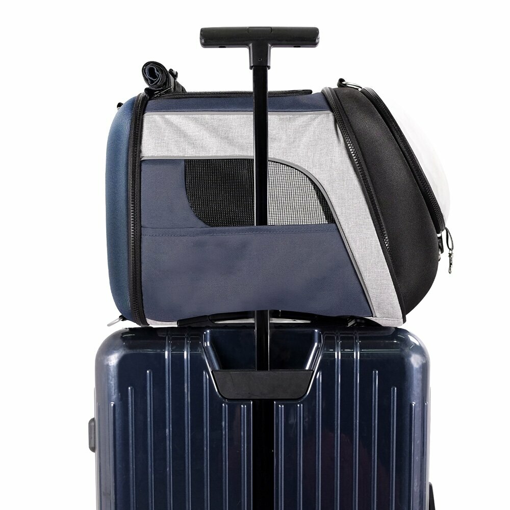 Velika torba za pse na potovanju z letali se preprosto namesti na kovček